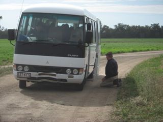 Len inspecting damage after a confrontation with a Kangaroo, front and side.